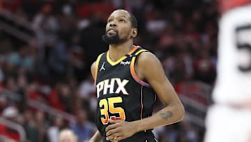 Mar 12, 2025; Houston, Texas, USA; Phoenix Suns forward Kevin Durant (35) reacts after a play during the first half against the Houston Rockets at Toyota Center. Mandatory Credit: Troy Taormina-Imagn Images