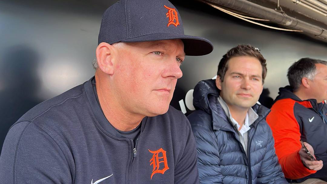 Detroit Tigers manager A.J. Hinch (left) and president of baseball operations Scott Harris (right) talk with reporters March 27, 2024, at Guaranteed Rate Field in Chicago.