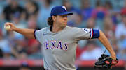 Jul 28, 2025; Anaheim, California, USA;  Texas Rangers starting pitcher Jacob deGrom (48) delivers to the plate during the first inning against the Los Angeles Angels at Angel Stadium. Mandatory Credit: Jayne Kamin-Oncea-Imagn Images