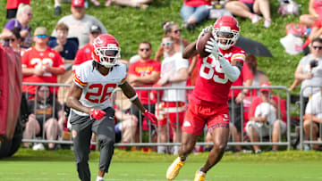 Jul 22, 2025; St. Joseph, MO, USA; Kansas City Chiefs wide receiver Jason Brownlee (89) catches a pass as safety Deon Bush (26) defends during training camp at Missouri Western State University. Mandatory Credit: Denny Medley-Imagn Images