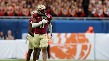 Dec 30, 2023; Miami Gardens, FL, USA; Florida State Seminoles defensive lineman Patrick Payton (11) reacts against the Georgia Bulldogs during the first half in the 2023 Orange Bowl at Hard Rock Stadium. Mandatory Credit: Nathan Ray Seebeck-Imagn Images