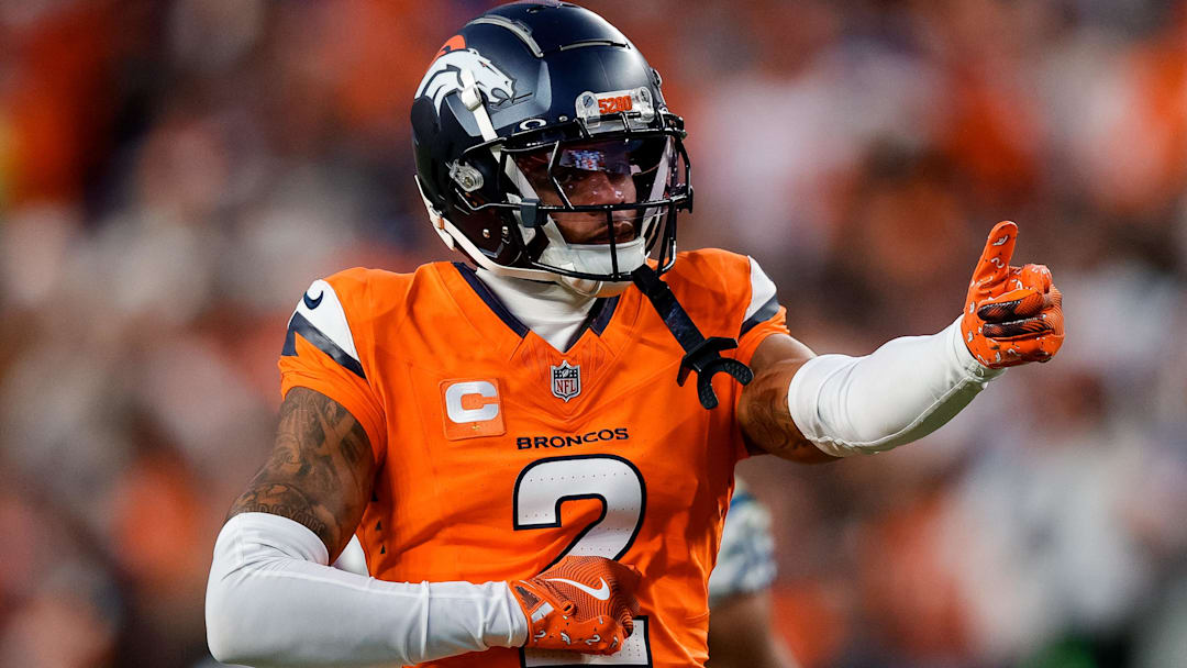 Dec 15, 2024; Denver, Colorado, USA; Denver Broncos cornerback Pat Surtain II (2) gestures after a play in the third quarter against the Indianapolis Colts at Empower Field at Mile High. 