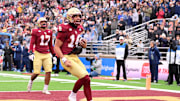 Nov 23, 2024; Chestnut Hill, Massachusetts, USA; Boston College Eagles quarterback Grayson James (14) reacts to his touchdown against the North Carolina Tar Heels during the first half at Alumni Stadium. Mandatory Credit: Eric Canha-Imagn Images