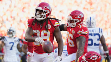 Nov 23, 2025; Kansas City, Missouri, USA; Kansas City Chiefs running back Kareem Hunt (29) celebrates after scoring a touchdown against the Indianapolis Colts in the second half at GEHA Field at Arrowhead Stadium. Mandatory Credit: Jay Biggerstaff-Imagn Images
