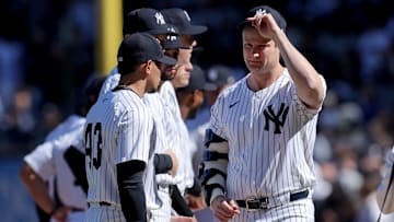 New York Yankees injured starting pitcher Gerrit Cole (45) tips his cap towards the Milwaukee Brewers base line during introductions before an opening day game at Yankee Stadium on March 27.