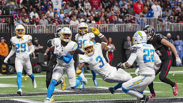 Los Angeles Chargers safety Marcus Maye intercepts a pass in the end zone against the Atlanta Falcons.