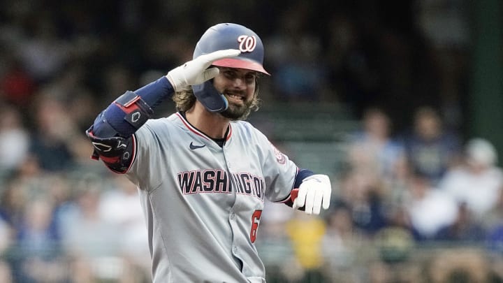 Jul 12, 2024; Milwaukee, Wisconsin, USA;  Washington Nationals designated hitter Jesse Winker (6) reacts after hitting a double during the first inning against the Milwaukee Brewers at American Family Field. Mandatory Credit: Jeff Hanisch-USA TODAY Sports