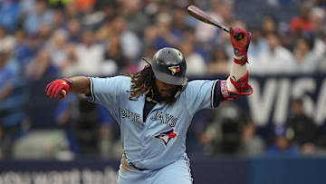Jun 27, 2023; Toronto, Ontario, CAN; Toronto Blue Jays first baseman Vladimir Guerrero Jr. (27) reacts after a strikeout against the San Francisco Giants during the first inning at Rogers Centre. Mandatory Credit: John E. Sokolowski-Imagn Images