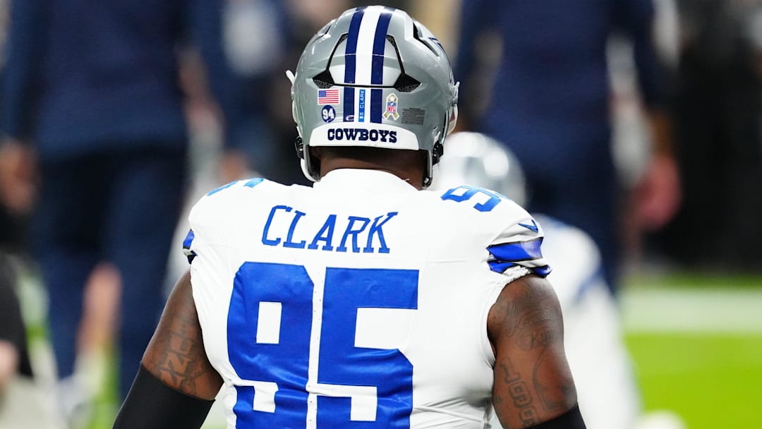 Nov 17, 2025; Paradise, Nevada, USA; Dallas Cowboys defensive tackle Kenny Clark (95) warms up prior to a game against the Las Vegas Raiders at Allegiant Stadium. The Cowboys will wear “94” decals on their helmets to honor teammate Marshawn Kneeland who tragically passed on November 6th. Mandatory Credit: Stephen R. Sylvanie-Imagn Images