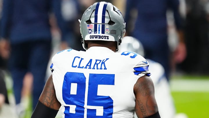 Nov 17, 2025; Paradise, Nevada, USA; Dallas Cowboys defensive tackle Kenny Clark (95) warms up prior to a game against the Las Vegas Raiders at Allegiant Stadium. The Cowboys will wear “94” decals on their helmets to honor teammate Marshawn Kneeland who tragically passed on November 6th. Mandatory Credit: Stephen R. Sylvanie-Imagn Images