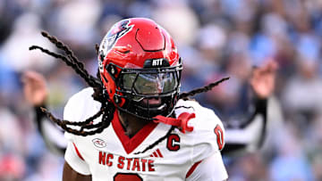 Nov 30, 2024; Chapel Hill, North Carolina, USA; North Carolina State Wolfpack linebacker Sean Brown (0) reacts after recovering a fumble in the first quarter at Kenan Memorial Stadium. Mandatory Credit: Bob Donnan-Imagn Images