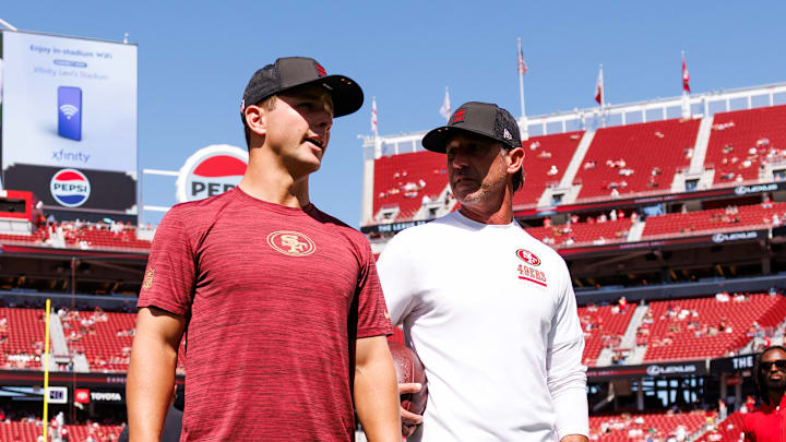 San Francisco 49ers quarterback Brock Purdy (L) and head coach Kyle Shanahan (R)
