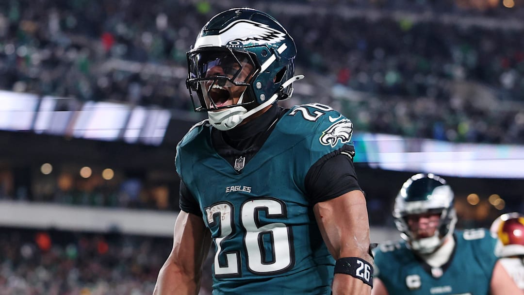 Jan 26, 2025; Philadelphia, PA, USA; Philadelphia Eagles running back Saquon Barkley (26) celebrates after a touchdown against the Washington Commanders during the second half in the NFC Championship game at Lincoln Financial Field. Mandatory Credit: Bill Streicher-Imagn Images