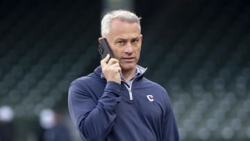 Jed Hoyer, Cubs President of Baseball Operations, speaks on the phone before a game at Wrigley Field