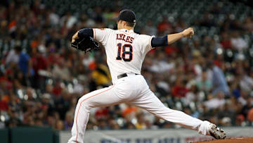Aug 6, 2013; Houston, TX, USA; Houston Astros starting pitcher Jordan Lyles (18) pitches during the first inning against the Boston Red Sox at Minute Maid Park. 