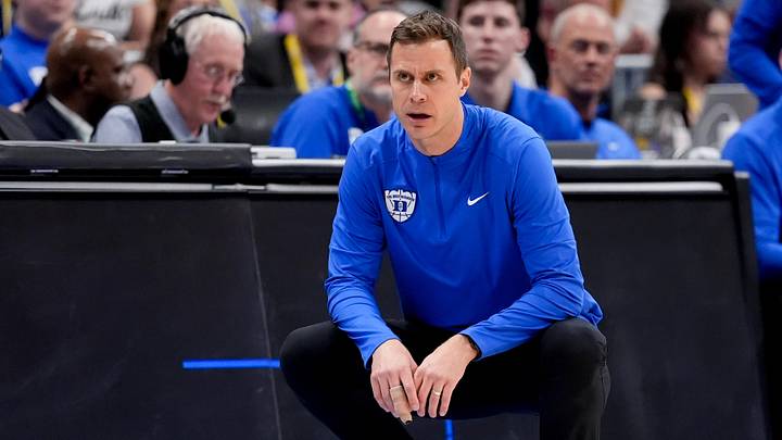 Mar 14, 2026; Charlotte, NC, USA; Duke Blue Devils head coach Jon Scheyer looks on against the Virginia Cavaliers during the men's ACC Conference Tournament Championship.