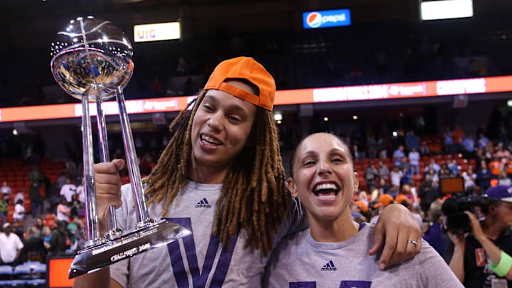 Sep 12, 2014; Chicago, IL, USA; Phoenix Mercury center Brittney Griner (left) and guard Diana Taurasi (right) celebrate with the WNBA championship trophy after defeating the Chicago Sky 87-82 in game three of the 2014 WNBA Finals at UIC Pavilion. Mandatory Credit: Jerry Lai-Imagn Images Sep 12, 2014; Chicago, IL, USA; Phoenix Mercury center Brittney Griner (left) and guard Diana Taurasi (right) celebrate with the WNBA championship trophy after defeating the Chicago Sky 87-82 in game three of the 2014 WNBA Finals at UIC Pavilion. Mandatory Credit: Jerry Lai-Imagn Images