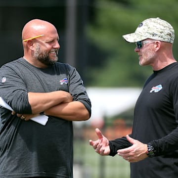 Daboll (left) spent four seasons as the Bills‘s offensive coordinator under McDermott (right). 