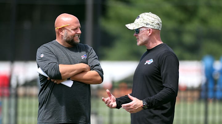 Daboll (left) spent four seasons as the Bills‘s offensive coordinator under McDermott (right). 