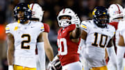 Nov 22, 2025; Stanford, California, USA; Stanford Cardinal running back Micah Ford (20) gestures to the crowd after a first down during the fourth quarter against the California Golden Bears at Stanford Stadium. Mandatory Credit: Sergio Estrada-Imagn Images