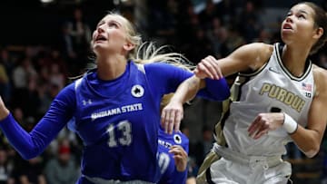 Indiana State Sycamores forward Saige Stahl (13) boxes out Purdue Boilermakers guard Amiyah Reynolds (1)