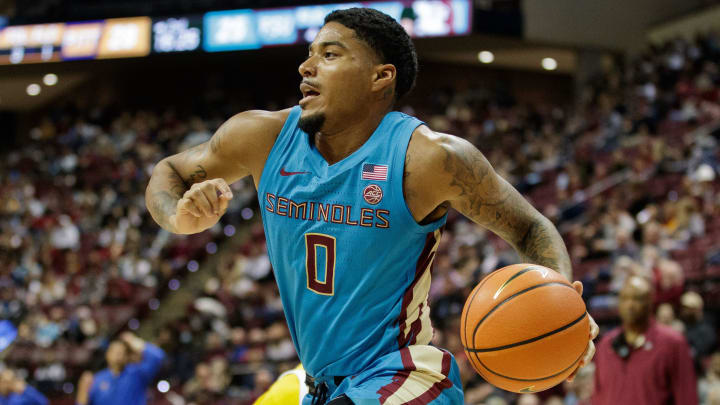 Florida State Seminoles guard RayQuan Evans (0) drives the ball to the basket.