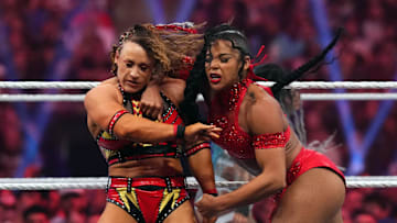 Jan 27, 2024; St. Petersburg, FL, USA; Bianca Belair (right) attacks Jordynne Grace during the Women's Royal Rumble match at Tropicana Field. Mandatory Credit: Joe Camporeale-Imagn Images