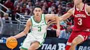 Mar 13, 2025; Indianapolis, IN, USA; Oregon Ducks guard Jackson Shelstad (3) dribbles the ball while Indiana Hoosiers guard Anthony Leal (3) defends in the second half at Gainbridge Fieldhouse. Mandatory Credit: Trevor Ruszkowski-Imagn Images