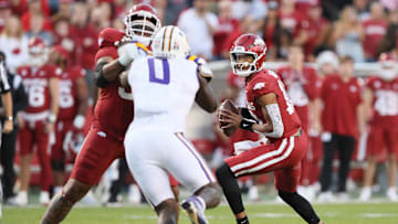 Oct 19, 2024; Fayetteville, Arkansas, USA; Arkansas Razorbacks quarterback Taylen Green (10) looks to pass against the LSU Tigers during the first quarter at Donald W. Reynolds Razorback Stadium. Mandatory Credit: Nelson Chenault-Imagn Images