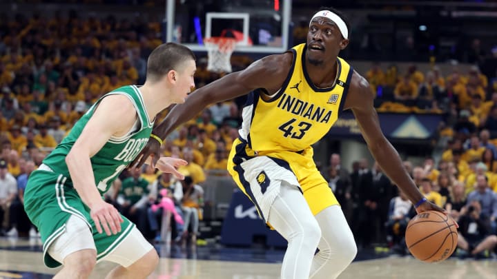 May 25, 2024; Indianapolis, Indiana, USA; Indiana Pacers forward Pascal Siakam (43) dribbles the ball against Boston Celtics guard Payton Pritchard (11) during the first quarter of game three of the eastern conference finals in the 2024 NBA playoffs at Gainbridge Fieldhouse. Mandatory Credit: Trevor Ruszkowski-USA TODAY Sports