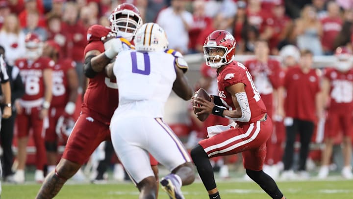 Oct 19, 2024; Fayetteville, Arkansas, USA; Arkansas Razorbacks quarterback Taylen Green (10) looks to pass against the LSU Tigers during the first quarter at Donald W. Reynolds Razorback Stadium. Mandatory Credit: Nelson Chenault-Imagn Images