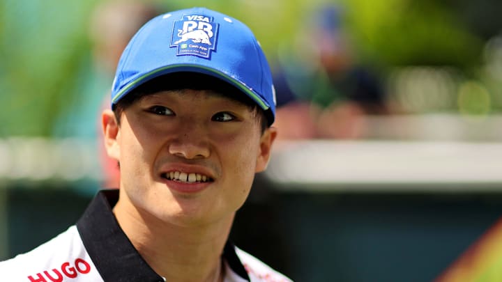 May 5, 2024; Miami Gardens, Florida, USA; RB racing driver Yuki Tsunoda (22) walks into the F1 Village before the F1 Miami Grand Prix at Miami International Autodrome. Mandatory Credit: Peter Casey-USA TODAY Sports