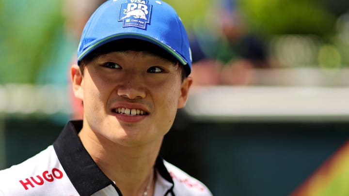 May 5, 2024; Miami Gardens, Florida, USA; RB racing driver Yuki Tsunoda (22) walks into the F1 Village before the F1 Miami Grand Prix at Miami International Autodrome. Mandatory Credit: Peter Casey-USA TODAY Sports