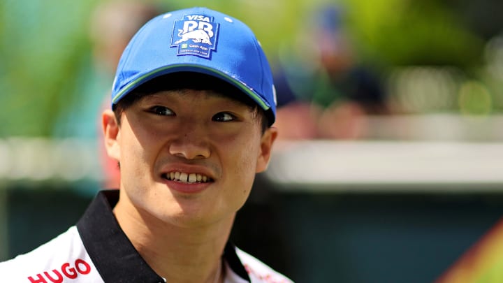 May 5, 2024; Miami Gardens, Florida, USA; RB racing driver Yuki Tsunoda (22) walks into the F1 Village before the F1 Miami Grand Prix at Miami International Autodrome. Mandatory Credit: Peter Casey-USA TODAY Sports