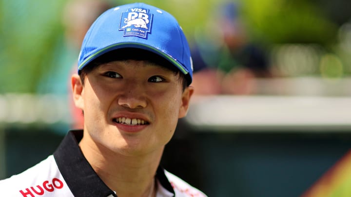 May 5, 2024; Miami Gardens, Florida, USA; RB racing driver Yuki Tsunoda (22) walks into the F1 Village before the F1 Miami Grand Prix at Miami International Autodrome. Mandatory Credit: Peter Casey-USA TODAY Sports