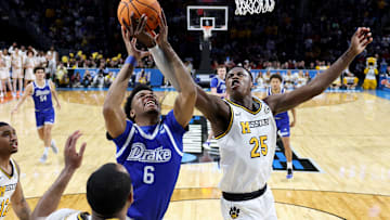 Missouri Tigers forward Mark Mitchell (25) blocks a player in a game versus the Drake Bulldogs, in the first round of the NCAA Tournament last season.