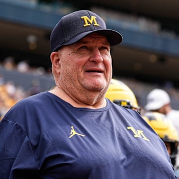 Michigan acting head coach Biff Poggi walks onto the field for second half against Central Michigan at Michigan Stadium in Ann Arbor on Saturday, Sept. 13, 2025.