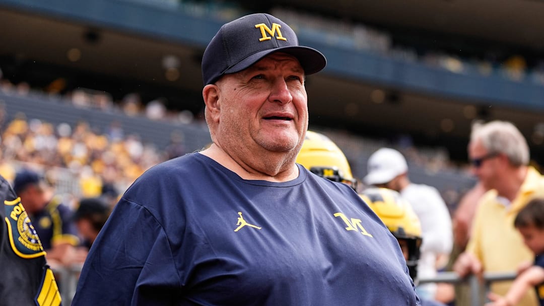 Michigan acting head coach Biff Poggi walks onto the field for second half against Central Michigan at Michigan Stadium in Ann Arbor on Saturday, Sept. 13, 2025.