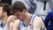 Mar 31, 2024; Dallas, TX, USA; Duke Blue Devils center Ryan Young (15) and center Kyle Filipowski (30) react from the bench in the second half against the North Carolina State Wolfpack in the finals of the South Regional of the 2024 NCAA Tournament at American Airline Center. Mandatory Credit: Tim Heitman-USA TODAY Sports