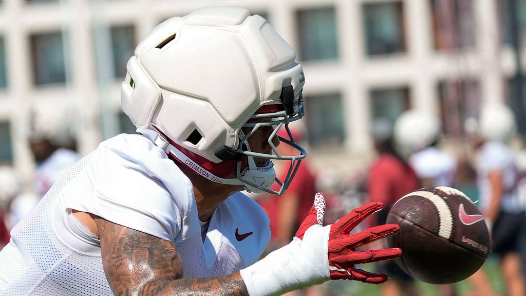 Cornerback Domani Jackson reaches out for a pass during Alabama training camp last year.