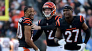 Nov 23, 2025; Cincinnati, Ohio, USA; Cincinnati Bengals place kicker Evan McPherson (2) celebrates with cornerback DJ Turner II (20) after kicking a field goal during the first half against the New England Patriots at Paycor Stadium. Mandatory Credit: Joseph Maiorana-Imagn Images