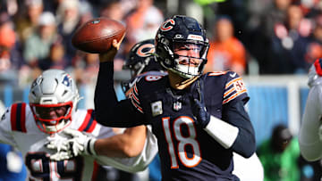 Nov 10, 2024; Chicago, Illinois, USA; Chicago Bears quarterback Caleb Williams (18) drops back to pass against the New England Patriots during the second half at Soldier Field. Mandatory Credit: Mike Dinovo-Imagn Images