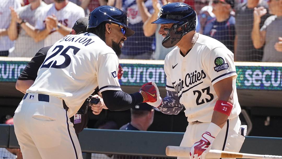 Jun 13, 2026; Minneapolis, Minnesota, USA; Minnesota Twins designated hitter Byron Buxton (25) celebrates his solo home run against the St. Louis Cardinals with first baseman Royce Lewis (23) in the fourth inning at Target Field. Jun 13, 2026; Minneapolis, Minnesota, USA; Minnesota Twins designated hitter Byron Buxton (25) celebrates his solo home run against the St. Louis Cardinals with first baseman Royce Lewis (23) in the fourth inning at Target Field.