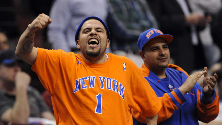 Mar 21, 2012; Philadelphia, PA, USA; New York Knicks fans celebrate late in the fourth quarter against the Philadelphia 76ers at the Wells Fargo Center. The Knicks defeated the Sixers 82-79. Mandatory Credit: Howard Smith-USA TODAY Sports