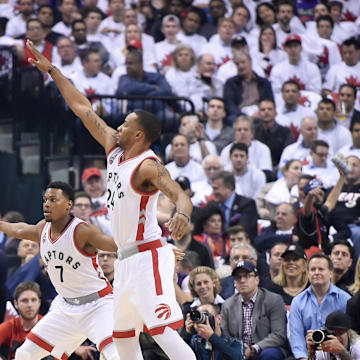 May 3, 2016; Toronto, Ontario, CAN;  Miami Heat guard Dwyane Wade (3) takes a shot over Toronto Raptors guards Norman Powell (24) and Kyle Lowry (7)  in game one of the second round of the NBA Playoffs at Air Canada Centre. Mandatory Credit: Dan Hamilton-Imagn Images