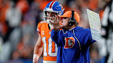 Nov 6, 2025; Denver, Colorado, USA; Denver Broncos quarterback Bo Nix (10) talks with head coach Sean Payton in the fourth quarter against the Las Vegas Raiders at Empower Field at Mile High. 