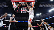 Chicago Bulls center Nikola Vucevic (9) dunks the ball against the San Antonio Spurs during the second half at United Center.