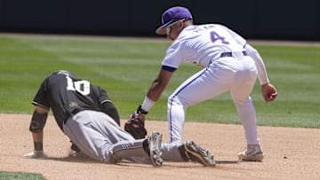 May 31, 2024; Chapel Hill, NC, USA; Wofford infielder Brice Martinez (10) dives for second covered by LSU infielder Steven Milam (4) during the NCAA Regional in Chapel Hill. Mandatory Credit: Jim Dedmon-Imagn Images
