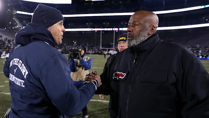 Penn State Nittany Lions head coach James Franklin (left) shakes hands at midfield with Maryland Terrapins head coach Michael Locksley 