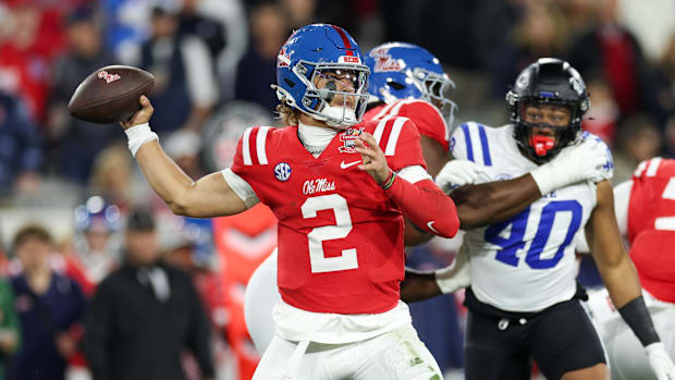 Mississippi Rebels quarterback Jaxson Dart (2) drops back to pass against the Duke Blue Devils